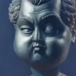 Face of a sculpture, caricature of a Roman General's face