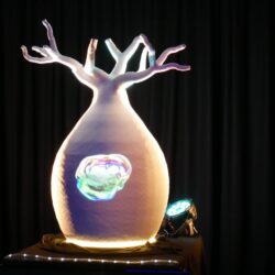Internally lit 2.1-metre baobab sculpture on stage, designed in 3D by Oddtoe and carved from polystyrene